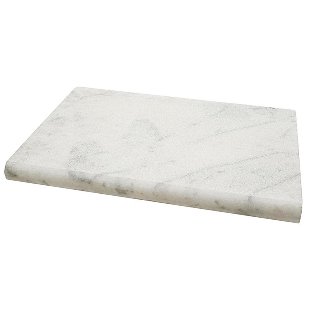 Glacier White Marble pool coping piece with gray veining and a rounded edge