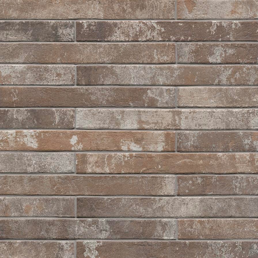 Reclaimed Red porcelain brick tile, 2 by 18 inch, in weathered red-brown tones