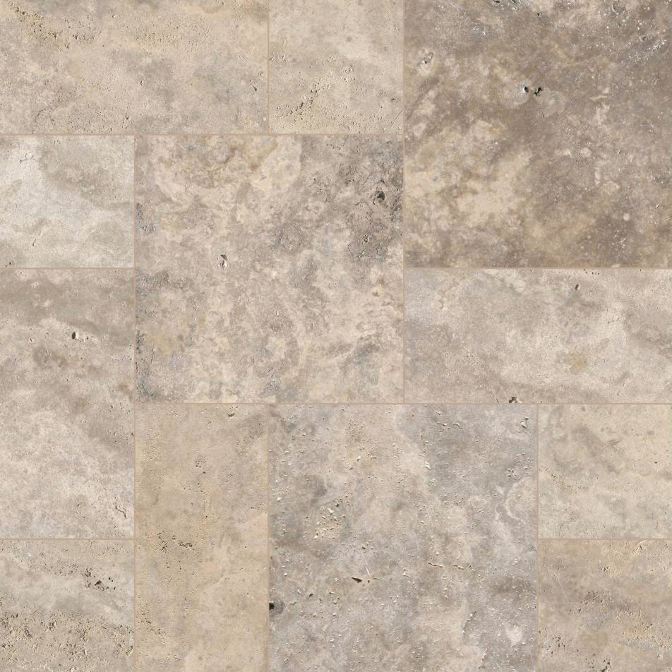 Silver Mist Travertine tumbled pavers in a French pattern