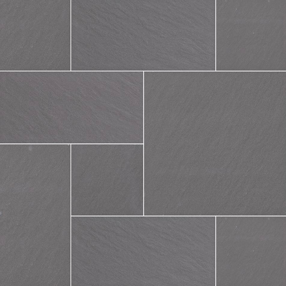 Slate Blue bluestone-look porcelain pavers laid in a pattern of mixed sizes